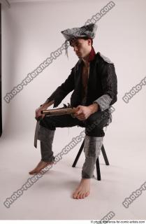 JACK PIRATE SITTING POSE WITH GUN AND DAGGER